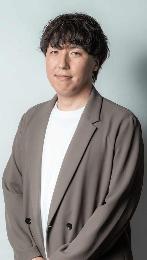 深石 賢哉